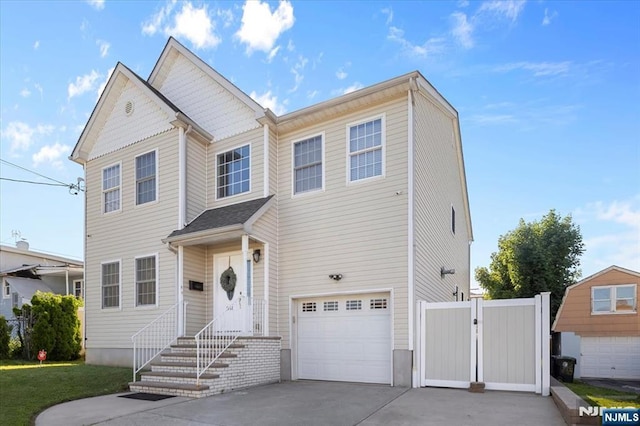 861 Birch St, Perth Amboy, NJ 08861 - view of front facade featuring a garage and driveway