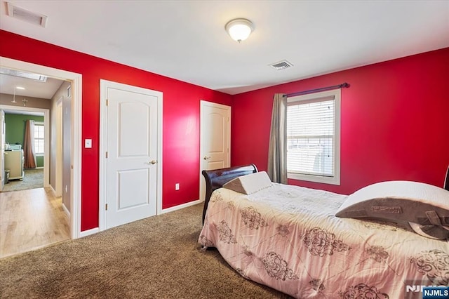 861 Birch St, Perth Amboy, NJ 08861 - carpeted bedroom with attic access and baseboards