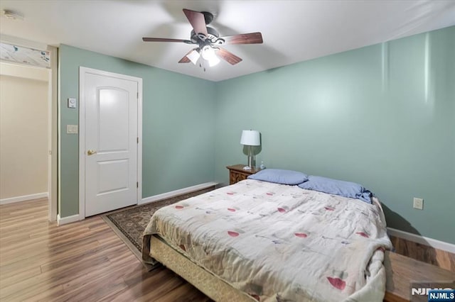 861 Birch St, Perth Amboy, NJ 08861 - bedroom featuring wood finished floors, baseboards, and ceiling fan