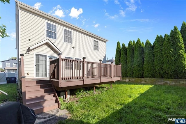 861 Birch St, Perth Amboy, NJ 08861 - rear view of property with a wooden deck and a yard