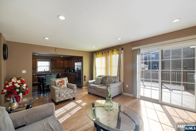 861 Birch St, Perth Amboy, NJ 08861 - living area with recessed lighting, light wood-style floors, and baseboards