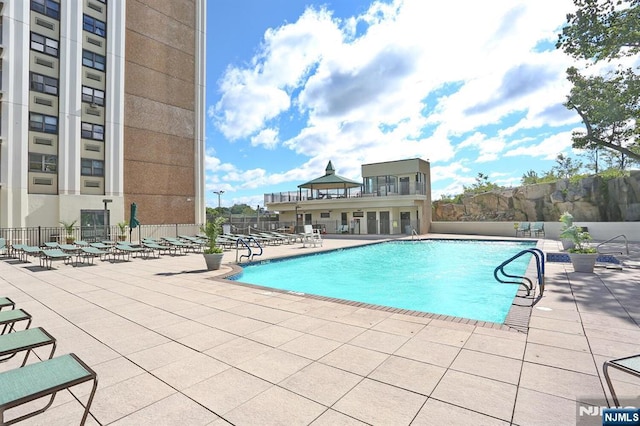 250 Gorge Rd Unit 12F, Cliffside Park, NJ 07010 - community pool featuring a patio
