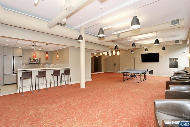 250 Gorge Rd Unit 12F, Cliffside Park, NJ 07010 - recreation room featuring baseboards and light carpet