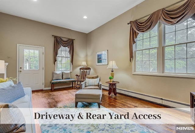640 E Glen Ave, Ridgewood, NJ 07450 - living area featuring wood finished floors, recessed lighting, a baseboard radiator, and baseboards