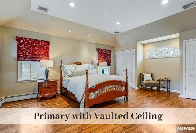 640 E Glen Ave, Ridgewood, NJ 07450 - bedroom with recessed lighting, multiple windows, wood finished floors, baseboards, and baseboard heating