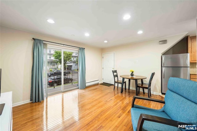 8 Sewall Unit 6B, Clifton, NJ 07011 - living area featuring baseboards, light wood-type flooring, recessed lighting, and a baseboard radiator
