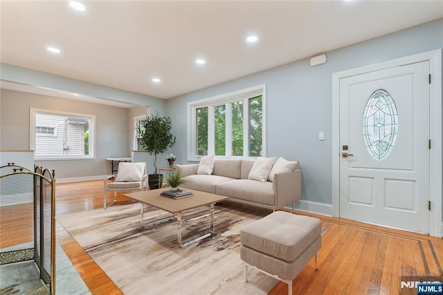 1153 Margaret St, Teaneck, NJ 07666 - living area with light wood-style flooring, baseboards, healthy amount of natural light, and recessed lighting
