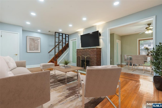 1153 Margaret St, Teaneck, NJ 07666 - living room featuring a fireplace, light wood finished floors, recessed lighting, a ceiling fan, and baseboards
