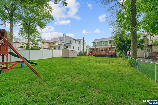 18 Cadmus St, Nutley, NJ 07110 - view of yard featuring a residential view, a playground, and a wooden deck