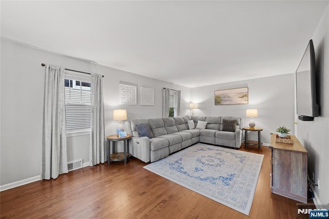 18 Cadmus St, Nutley, NJ 07110 - living area featuring wood finished floors and baseboards