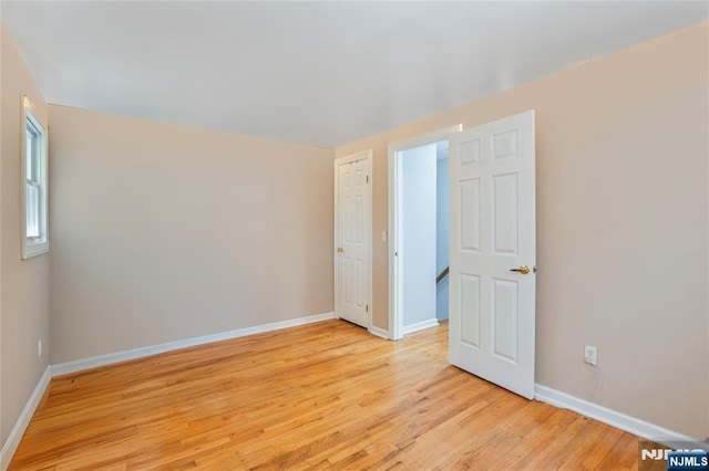 546 Atlas Rd, Roxbury Township, NJ 07850 - unfurnished room with light wood finished floors and baseboards