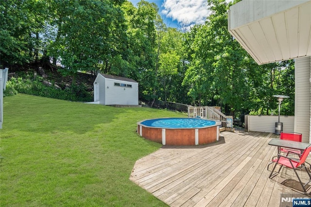 546 Atlas Rd, Roxbury Township, NJ 07850 - wooden terrace with an outdoor pool and view of wooded area