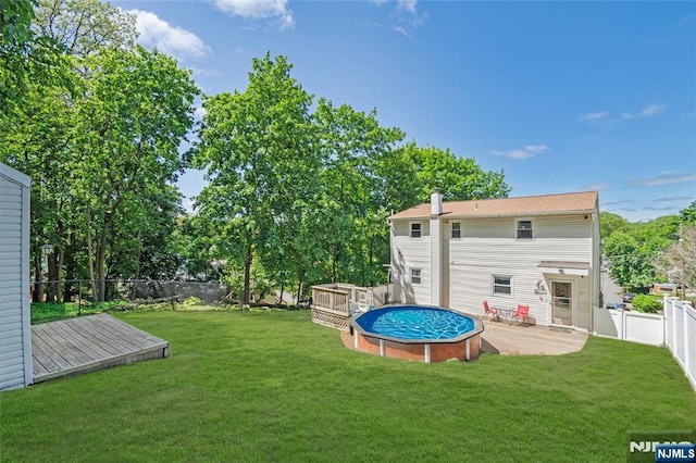 546 Atlas Rd, Roxbury Township, NJ 07850 - view of yard featuring a deck and an outdoor pool