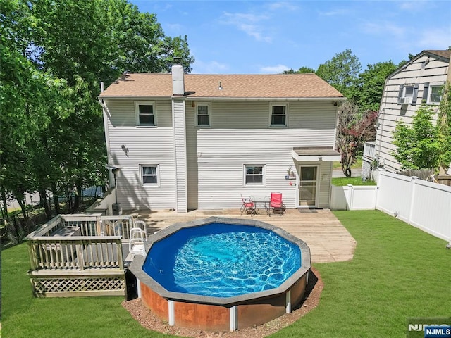 546 Atlas Rd, Roxbury Township, NJ 07850 - back of house featuring a deck and a chimney