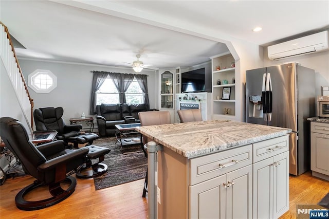 546 Atlas Rd, Roxbury Township, NJ 07850 - kitchen featuring stainless steel fridge, a wall unit AC, open floor plan, a ceiling fan, and ornamental molding