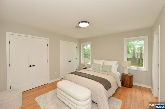 15-22 Radburn Rd, Fair Lawn, NJ 07410 - bedroom with two closets and light wood finished floors