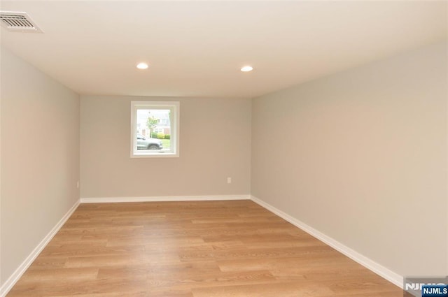 15-22 Radburn Rd, Fair Lawn, NJ 07410 - spare room with light wood-style floors and recessed lighting