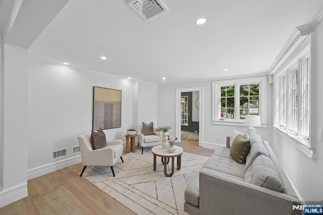 249 Valley Rd, Montclair, NJ 07042 - living area with light wood-type flooring, baseboards, recessed lighting, and ornamental molding