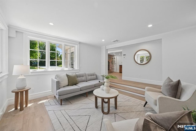 249 Valley Rd, Montclair, NJ 07042 - living area featuring light wood finished floors, plenty of natural light, baseboards, recessed lighting, and ornamental molding