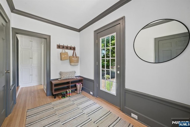249 Valley Rd, Montclair, NJ 07042 - entryway featuring crown molding and light wood finished floors