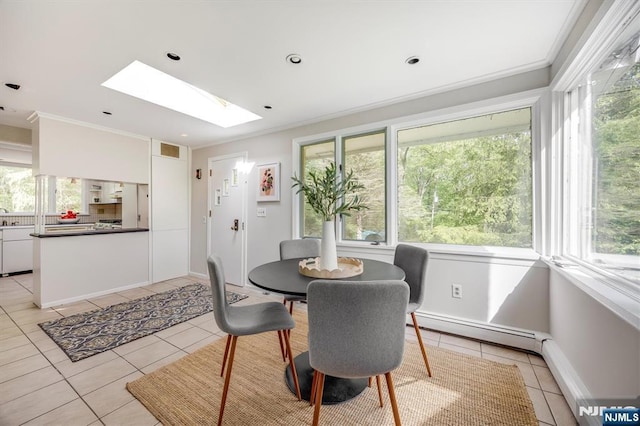 60 Leach Dr, Bloomingdale, NJ 07403 - dining room featuring a skylight, light tile patterned floors, plenty of natural light, and ornamental molding
