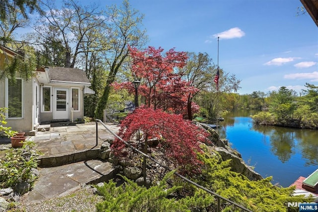 60 Leach Dr, Bloomingdale, NJ 07403 - view of yard featuring a water view and a patio area
