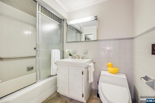 60 Leach Dr, Bloomingdale, NJ 07403 - full bathroom with toilet, vanity, tile walls, ornamental molding, and shower / bath combination with glass door