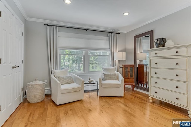 61 Ferndale Rd, Paramus, NJ 07652 - living area with ornamental molding, a baseboard heating unit, light wood finished floors, recessed lighting, and baseboard heating