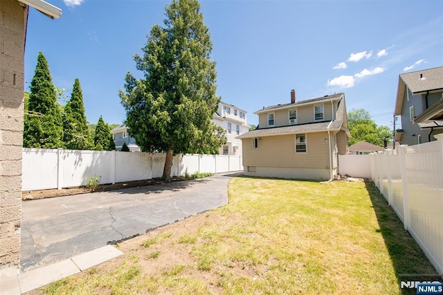 65 Byrne St, Hackensack, NJ 07601 - view of yard with a patio area