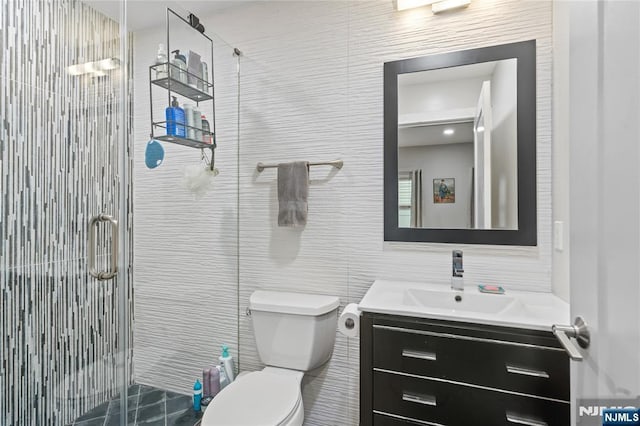 172 S St Unit 2A, Jersey City, NJ 07307 - full bathroom with tile walls, vanity, toilet, and a stall shower
