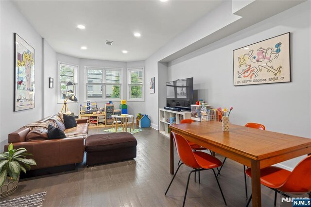 172 S St Unit 2A, Jersey City, NJ 07307 - living area with recessed lighting, wood finished floors, and baseboards