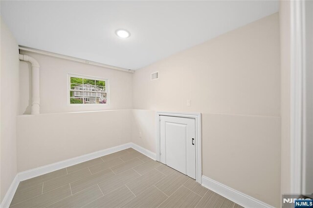 16 Coles Ct, River Edge, NJ 07661 - unfurnished room with baseboards