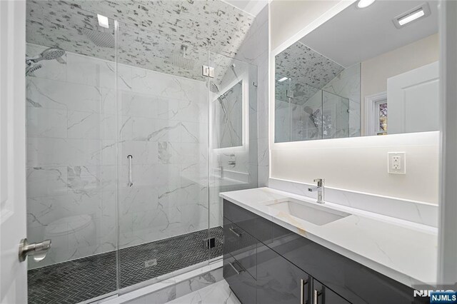 16 Coles Ct, River Edge, NJ 07661 - bathroom featuring marble finish floors, vanity, and a marble finish shower