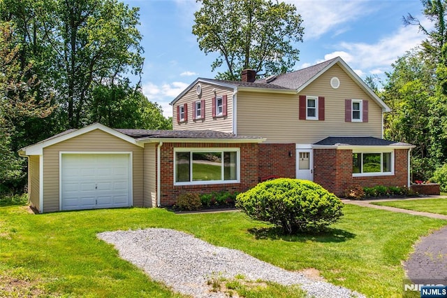 16 Dalewood Rd, Wayne, NJ 07470 - traditional-style house with brick siding, a chimney, an attached garage, a front yard, and driveway