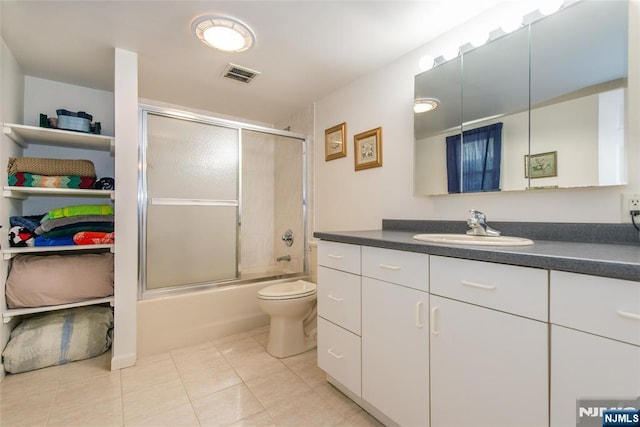 16 Dalewood Rd, Wayne, NJ 07470 - full bathroom featuring vanity, tile patterned floors, enclosed tub / shower combo, and toilet