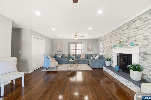 97 Avenue Ave, Lodi, NJ 07644 - living room with ceiling fan, wood finished floors, a fireplace with raised hearth, and recessed lighting