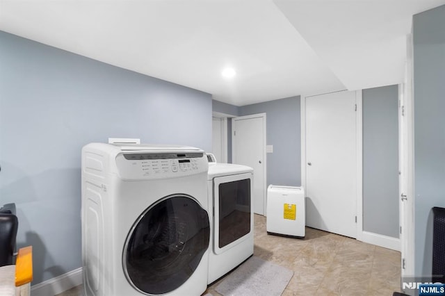 97 Avenue Ave, Lodi, NJ 07644 - washroom with separate washer and dryer and baseboards