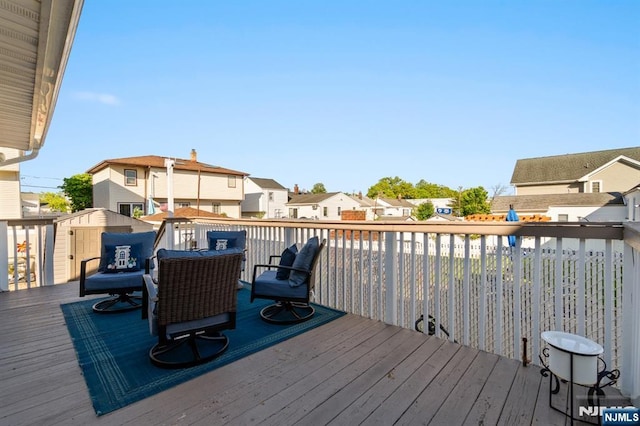 97 Avenue Ave, Lodi, NJ 07644 - wooden terrace featuring a residential view