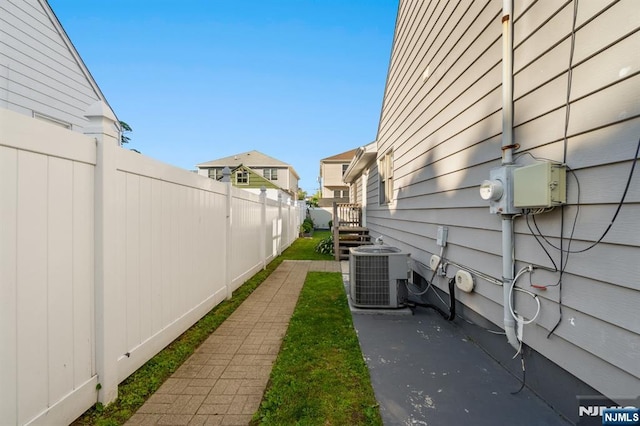 97 Avenue Ave, Lodi, NJ 07644 - view of yard featuring cooling unit and a residential view
