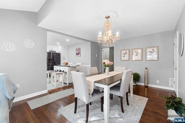 97 Avenue Ave, Lodi, NJ 07644 - dining area with wood finished floors, baseboards, a chandelier, and recessed lighting