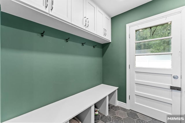 4 Kimberly Way, River Edge, NJ 07661 - mudroom with baseboards and dark tile patterned flooring
