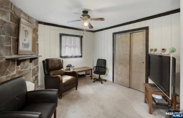 202 Linden Ave, Verona, NJ 07044 - living area featuring ceiling fan, light colored carpet, and ornamental molding