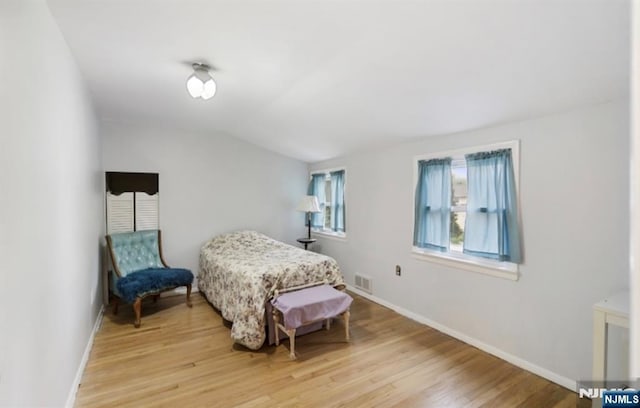 202 Linden Ave, Verona, NJ 07044 - bedroom with vaulted ceiling, light wood-style flooring, and baseboards