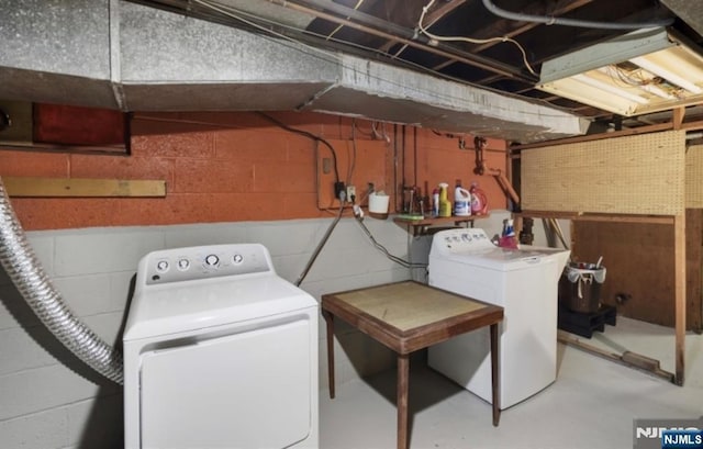 202 Linden Ave, Verona, NJ 07044 - laundry room featuring separate washer and dryer and concrete block wall