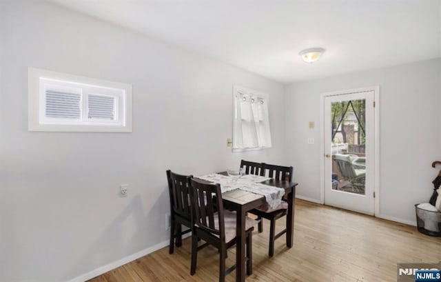 202 Linden Ave, Verona, NJ 07044 - dining room featuring baseboards and light wood-type flooring