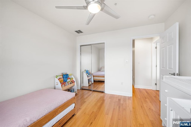 41 Lydia Dr Unit 41, West New York, NJ 07093 - bedroom featuring light wood-style floors, a closet, baseboards, and ceiling fan