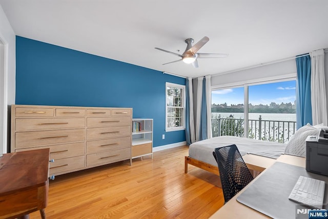 41 Lydia Dr Unit 41, West New York, NJ 07093 - bedroom featuring access to outside, light wood-type flooring, baseboards, and a ceiling fan