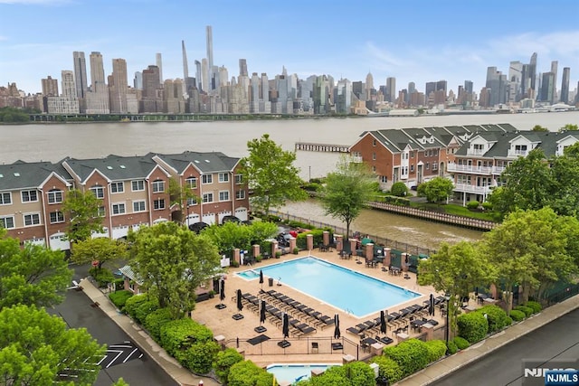 41 Lydia Dr Unit 41, West New York, NJ 07093 - bird's eye view of a pool, city skyline, and a nearby body of water