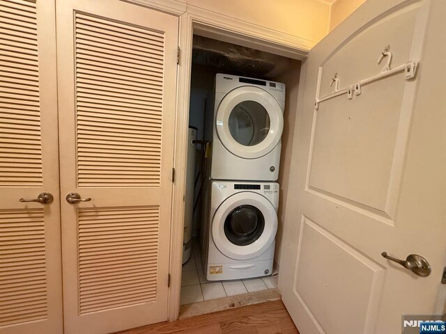 124 68th St Unit 204, Guttenberg, NJ 07093 - washroom featuring stacked washer / dryer
