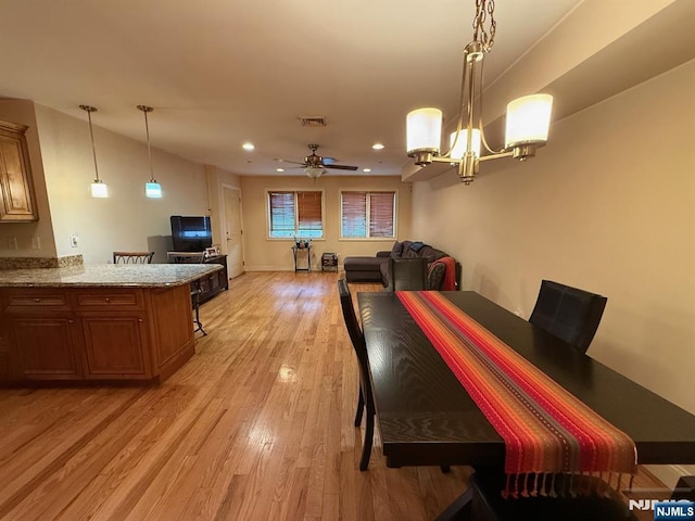 124 68th St Unit 204, Guttenberg, NJ 07093 - dining room featuring light wood-type flooring, a chandelier, recessed lighting, and a ceiling fan